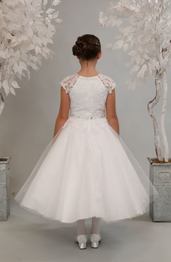 Stunning first holy communion dress has lace cap sleeves and bodice with rhinestone waist detail