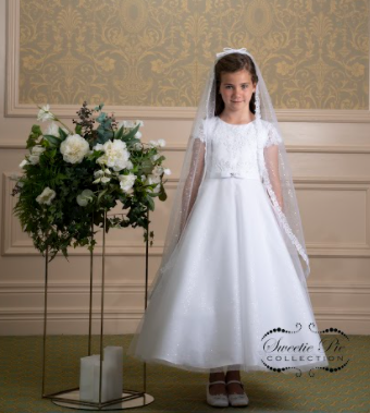 Elegant short sleeved first holy communion gown by Sweetie Pie  with rhinestone detailing