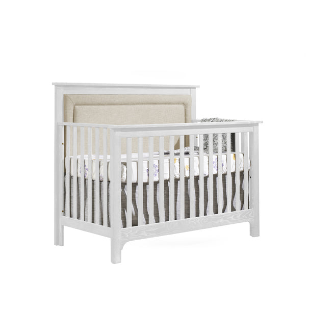 Nest Emerson Convertible Crib in White w/ Upholstered Panel in Talc